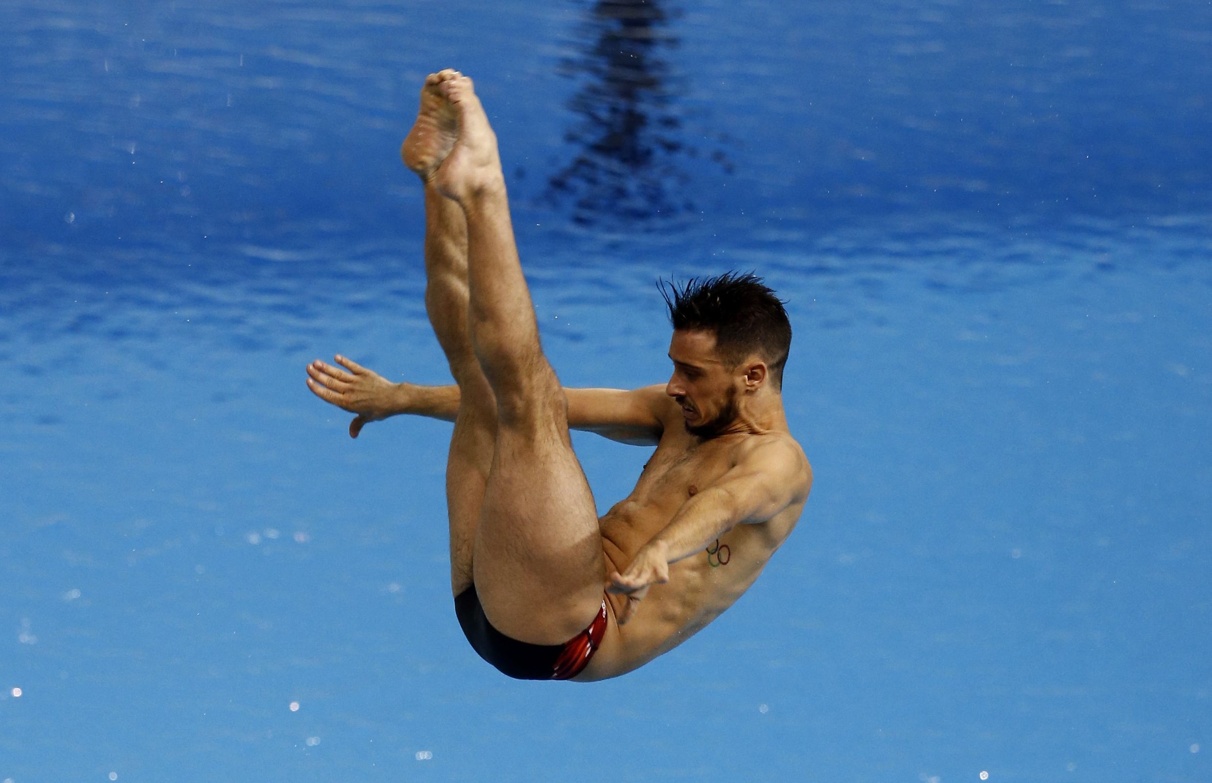 Jul 11, 2015; Toronto, Ontario, CAN; Francois Imbeau-Dulac of Canada competes in the men's 3m springboard final during the 2015 Pan Am Games at Pan Am Aquatics UTS Centre and Field House. Mandatory Credit: Rob Schumacher-USA TODAY Sports