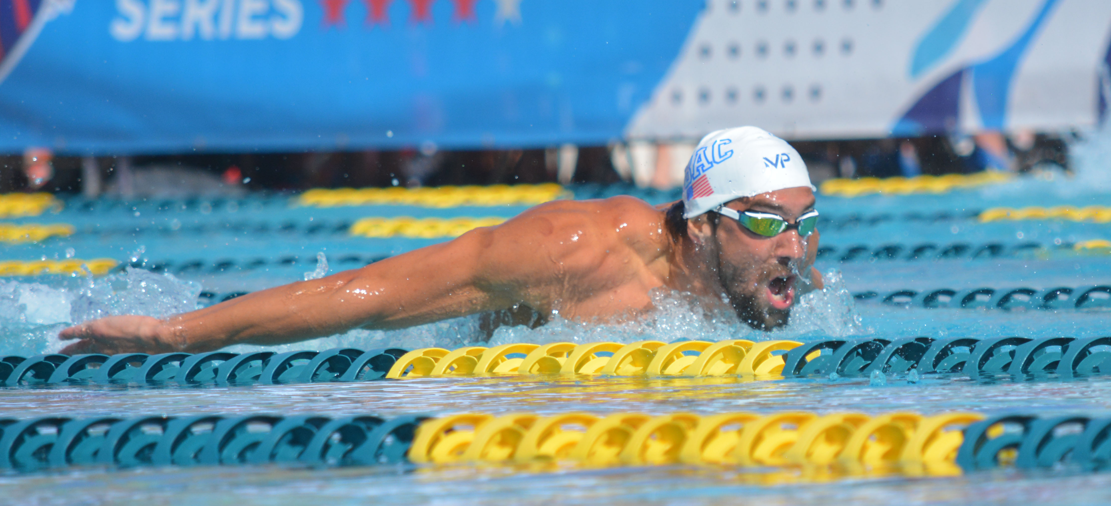 michael-phelps-holds-off-a-strong-back-half-from-pace-clark-to-claim