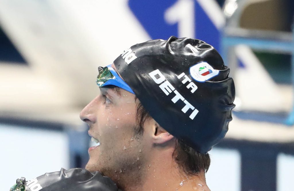 Aug 13, 2016; Rio de Janeiro, Brazil; Gregorio Paltrinieri (ITA) celebrates with Gabriele Detti (ITA) after the men's 1500m freestyle final in the Rio 2016 Summer Olympic Games at Olympic Aquatics Stadium. Mandatory Credit: Erich Schlegel-USA TODAY Sports