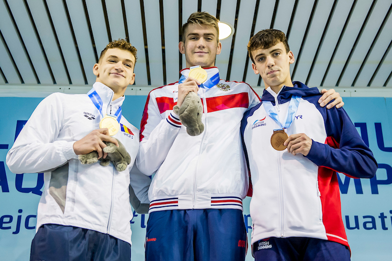 Podium KOLESNIKOV Kliment RUS Gold Medal MARTIN Daniel-Cristian ROU Silver Medal PYLE Nicholas GBR Bronze Medal 100 Backstroke Men Finals LEN 45th European Junior Swimming Championships Helsinki, Finland M‰kel‰nrinne Swimming Centre Day02 05-07-2018 Photo Andrea Masini/Deepbluemedia/Insidefoto