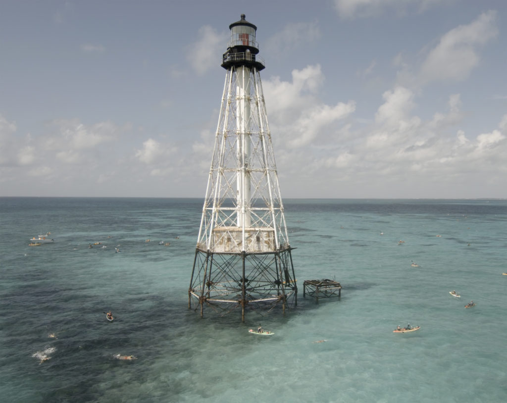 Competitors in the Swim for Alligator Lighthouse, an open-water, long-distance event, round the Florida Keys lighthouse and head to shore Saturday, Sept. 11, 2021, near Islamorada, Fla. The event began in 2013 to help raise awareness about preserving the almost 150-year-old lighthouse as well as five other lighthouses off the Keys. This year’s contest attracted 461 swimmers. FOR EDITORIAL USE ONLY (Steve Panariello/Florida Keys News Bureau/HO)